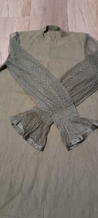 Sweterek na stójce z przeźroczystymi rękawami