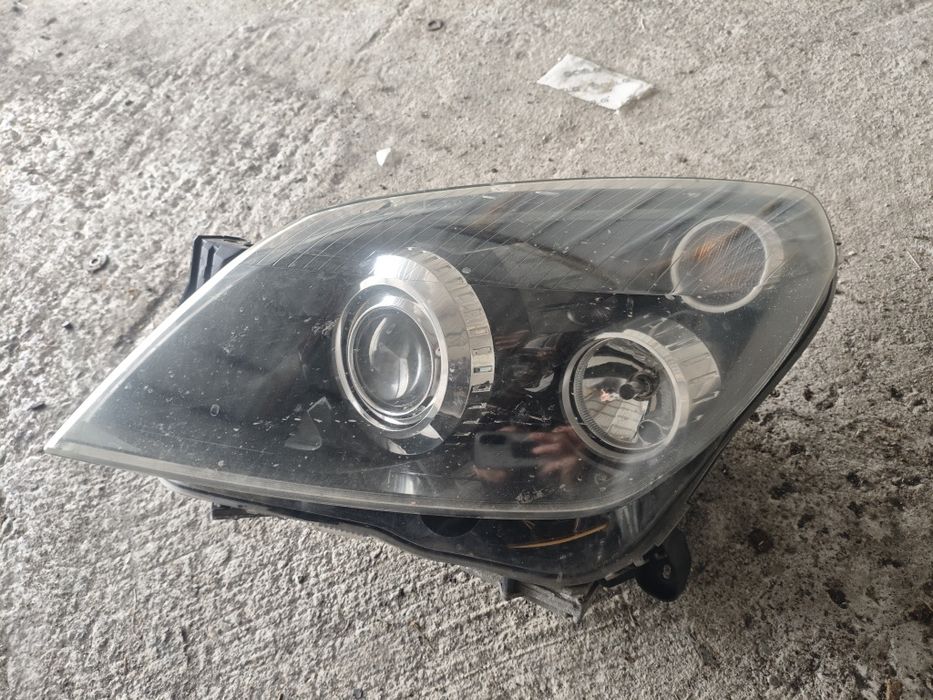 Reflektor Xenon lewa opel astra h