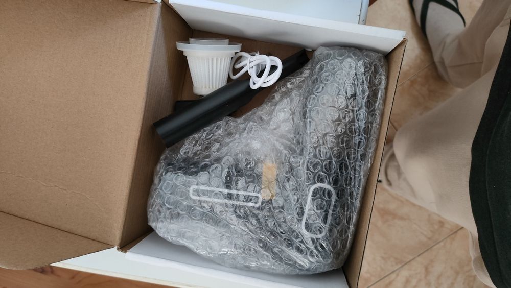 Mini aspirador portátil