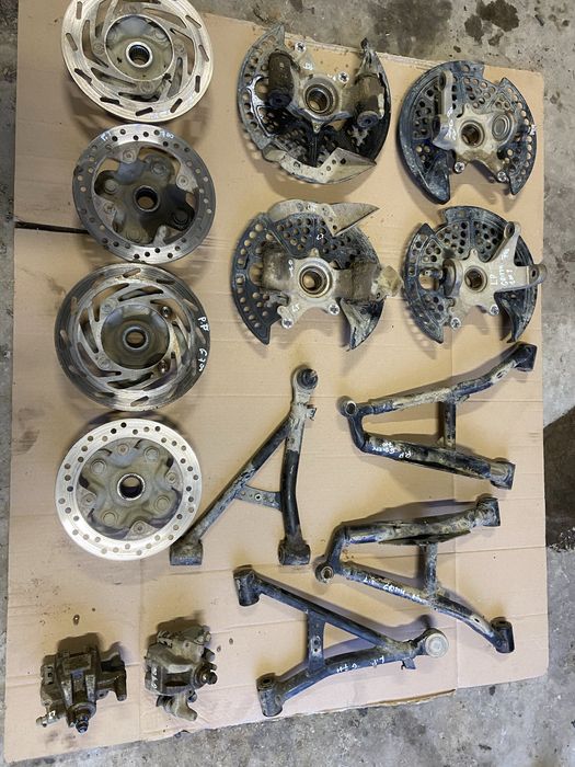 Wahacz lewy prawy zwrotnica piasta zacisk hamulcowy częśći grizzly 700