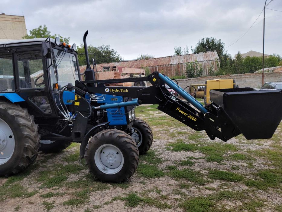 Быстросйомный фронтальный погрузчик кун Юмз