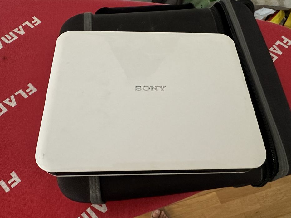 Dvd portatil com carregador de isqueiro