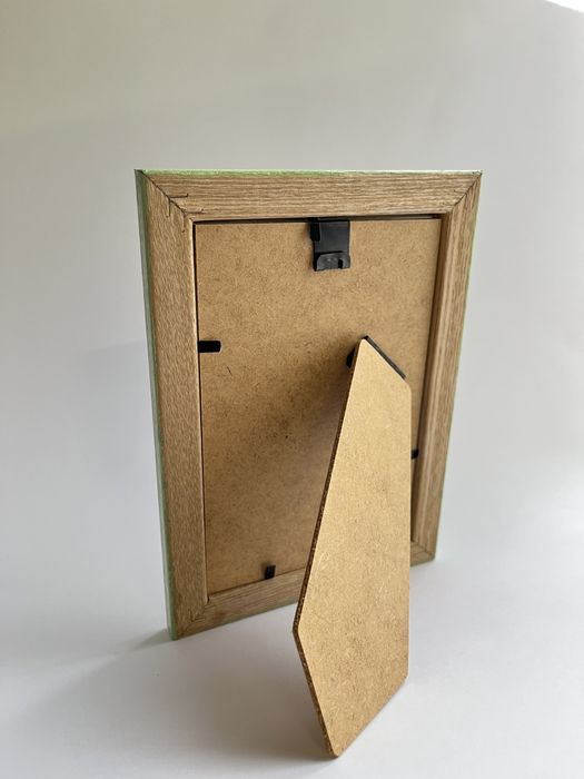 Рамка для фото з петриківським розписом