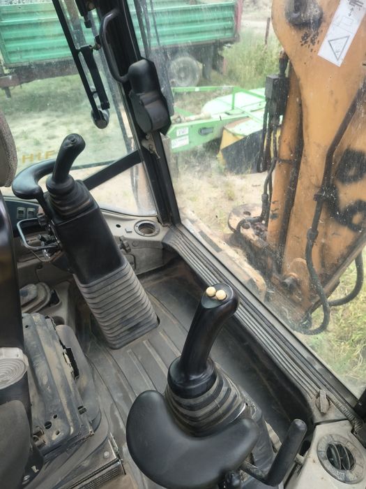 Case 695 super sr  joystick  (nie jcb 4cx )