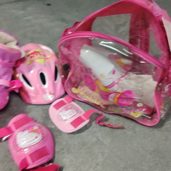 Conjunto patins em linha e proteção infantil