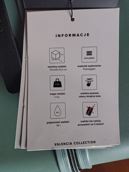 Duża walizka z poliwęglanu zielona