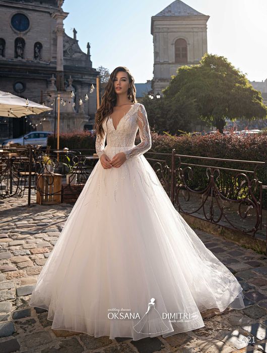 WYPRZEDAŻ Nowa suknia slubna bogato zdobiona z rękawem blyszczaca 38