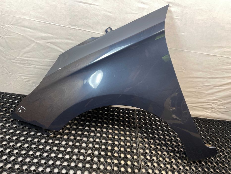 Błotnik przód przedni lewy kia carens iv kod lakieru: ku9 2013-