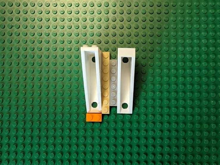 Suporte de parede compatível com LEGO®