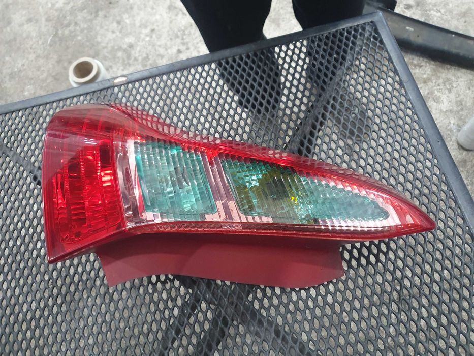 Lampa tyl tylna lewa Citroen c4 coupe 3 drzwi oryginalna europa