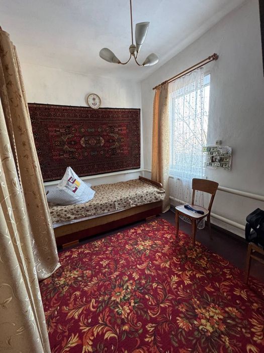 Продається будинок з гаражем деревяний обкладений цеглою вул. Київська