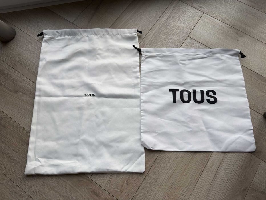 Białe worki firmy Tous