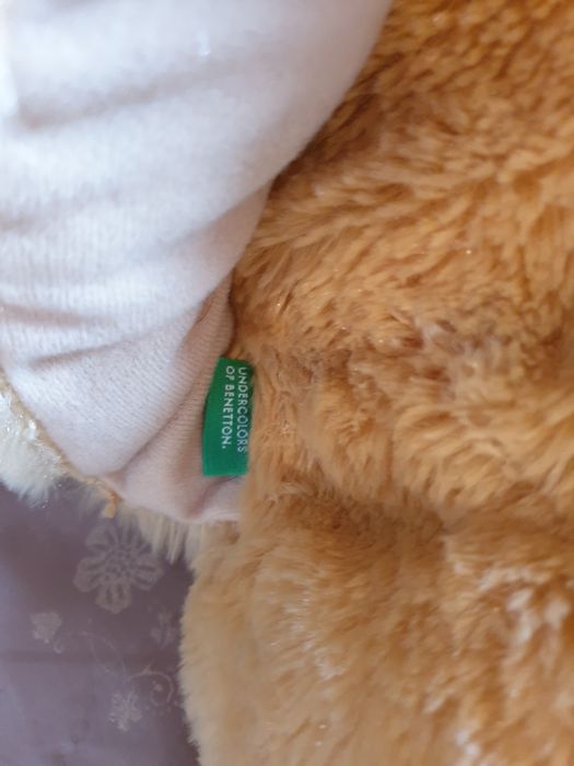 Descansa pés em pêlo Benetton