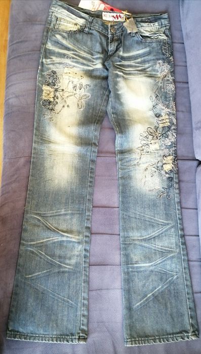 Nowe spodnie jeansy 40