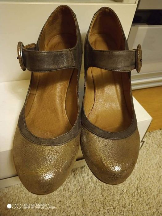 Złote pantofle Clarks