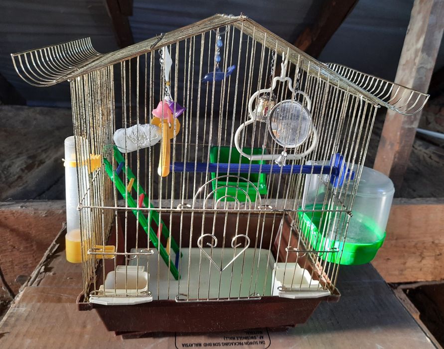 Клітка для папуги