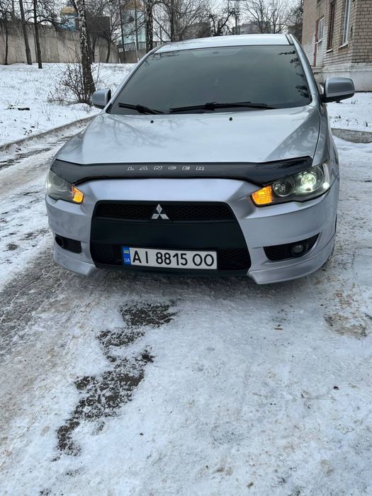 Mitsubishi lancer X автомат кожа на газу