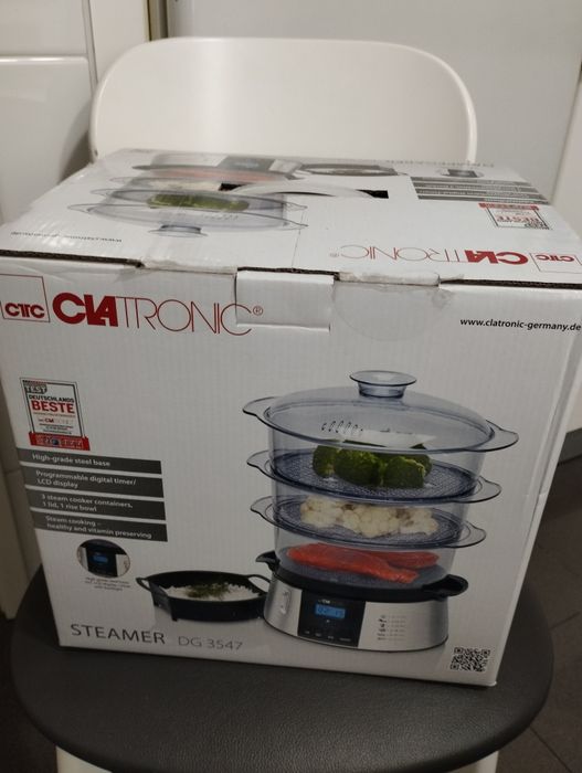 Panela de cozer a vapor em estado perfeito