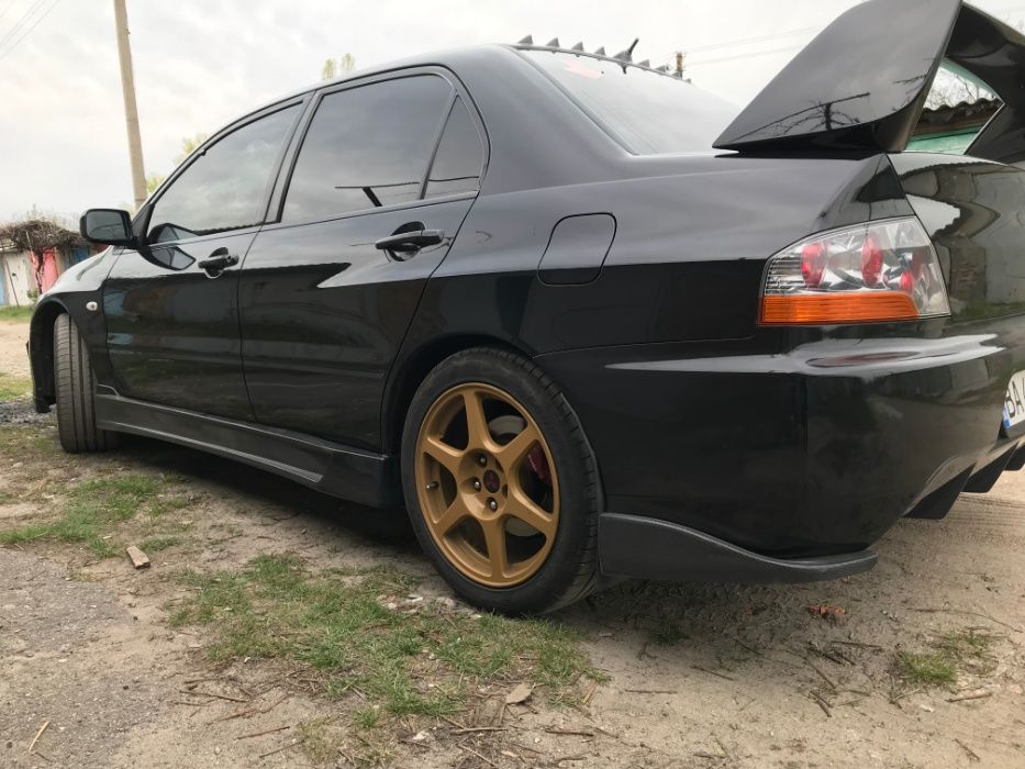Накладки на задний бампер Lancer Evo