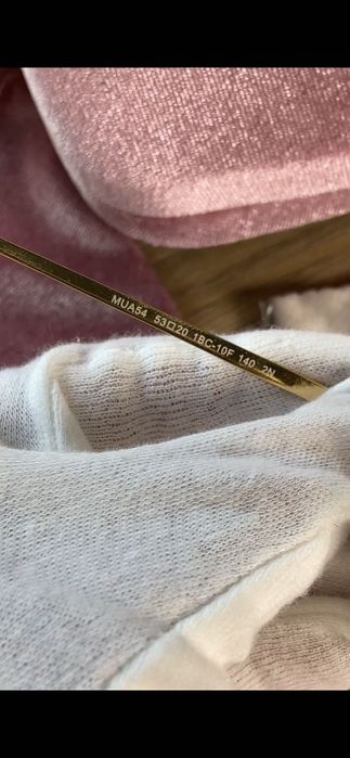 Окуляри від міу міу