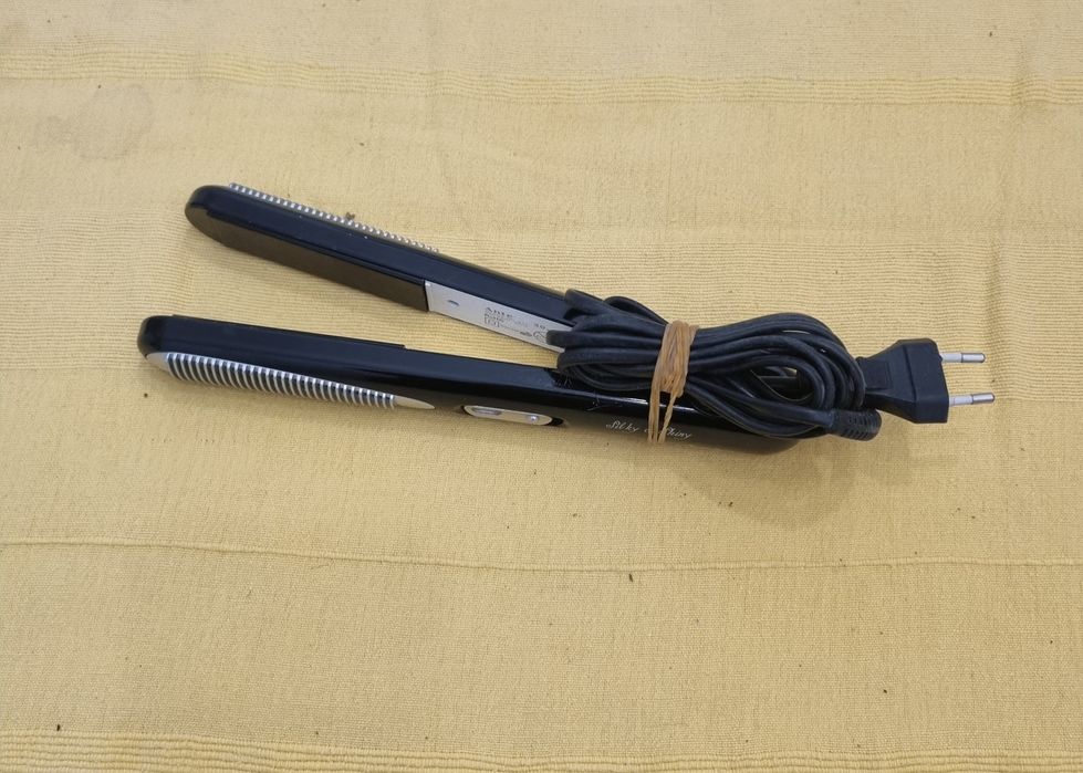 Alisador Cabelo a trabalhar