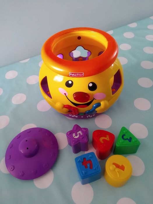 Garnuszek na klocuszek Fisher Price