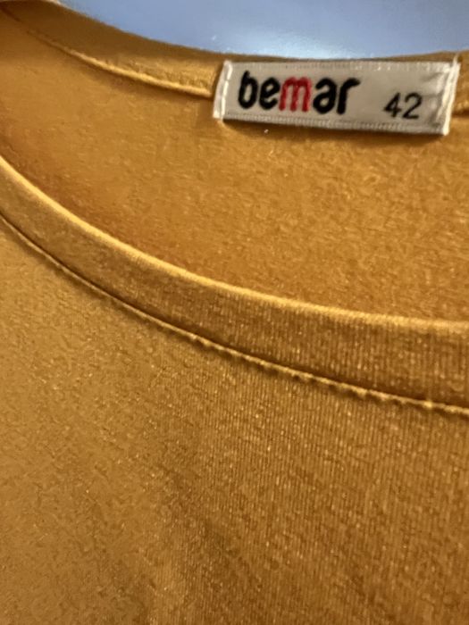 Żółta czarna bluzka nietoperz elegancka