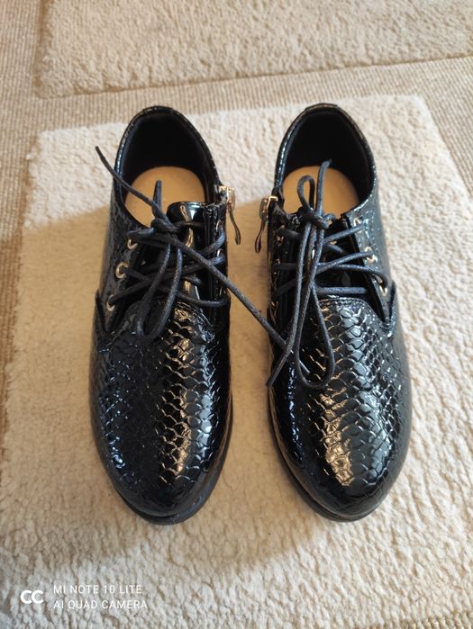 Туфельки на дівчинку