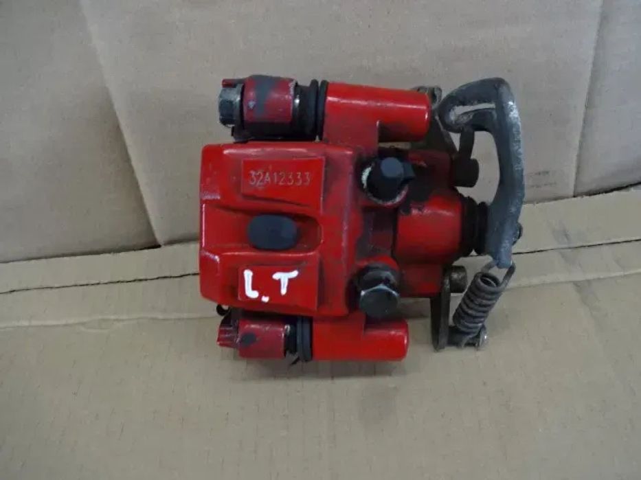 MICROCAR M.GO LIGIER IXO JS50 ZACISK TYŁ LEWY