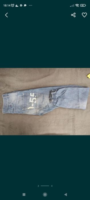 Męskie spodnie jeansowe Cross rozmiar M