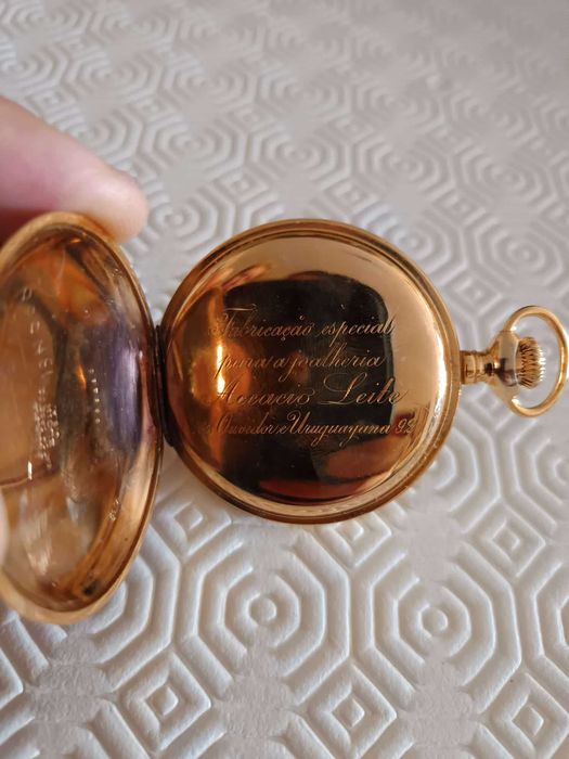 Relógio de bolso Omega,em prata dourada, antigo
