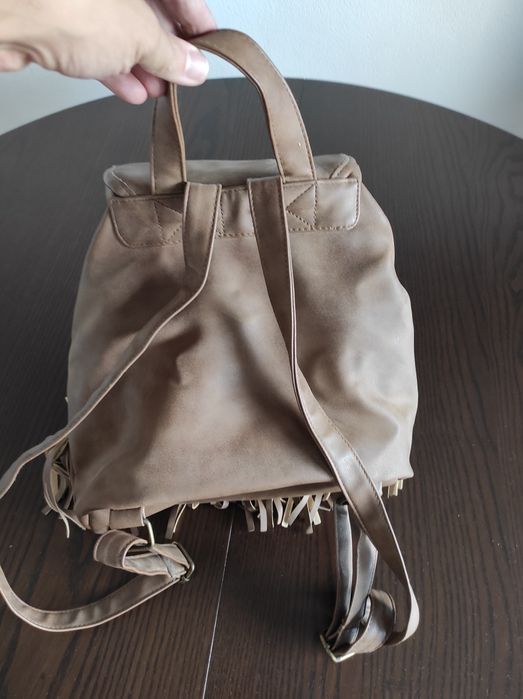 Mochila em pele - bom estado