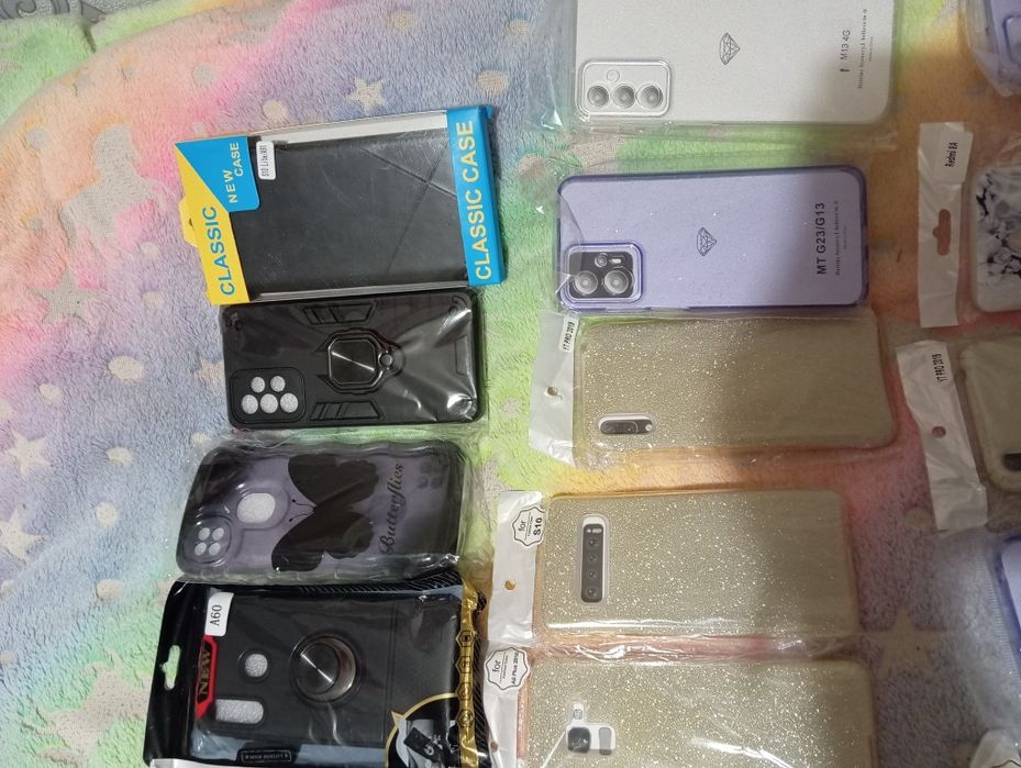 Мега лот чехлов -книжка и бамперов на разные модели телефона.