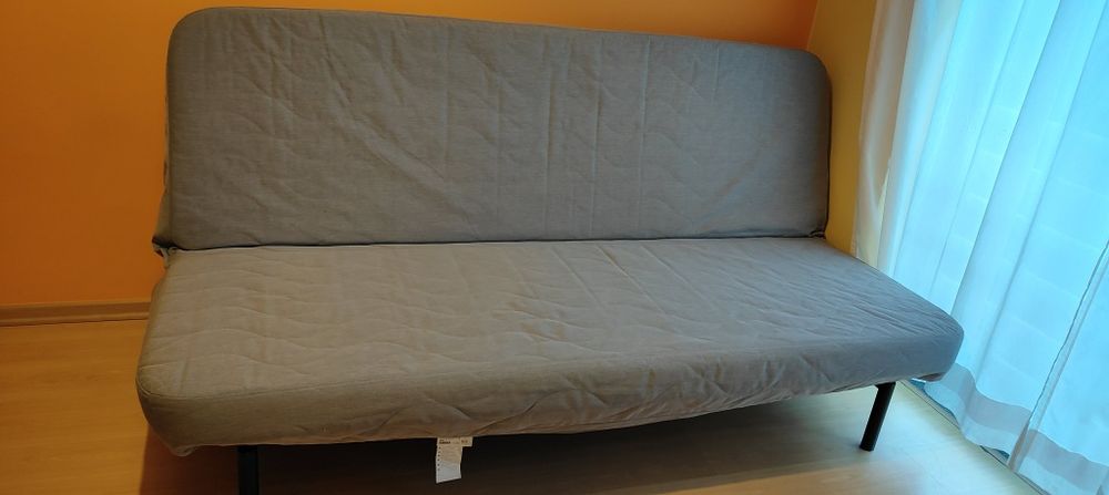 Sofá cama cinzento em bom estado