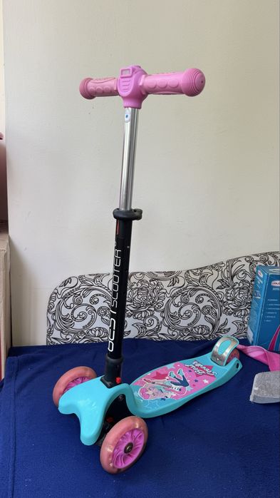 Самокат для дівчинки