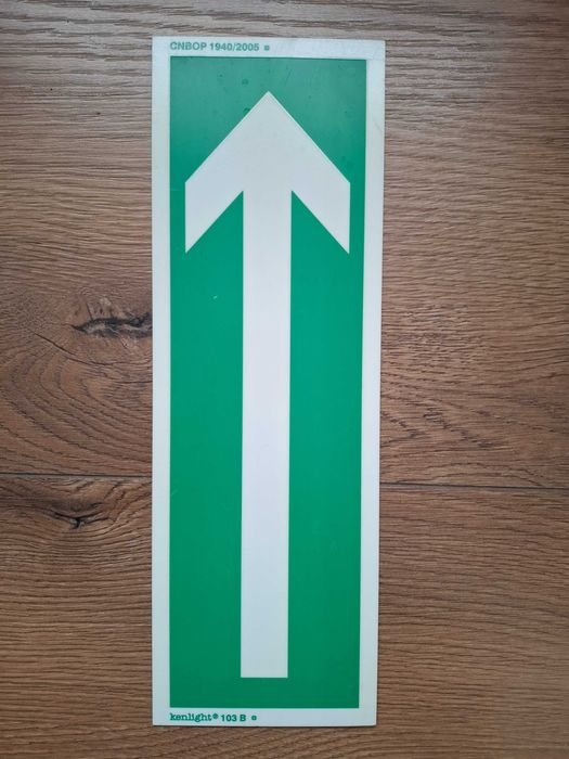 Znak strzałka ewakuacja fluorescencyjna