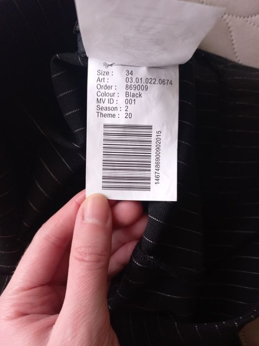 Spodnie bootcut z rozciętymi na dole nogawkami, 75% wiskozy