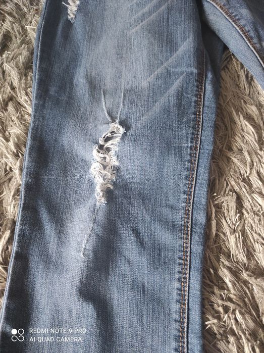 Spodnie dżinsowe " porwane"