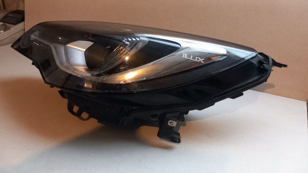 Lampa przednia lewa opel astra k