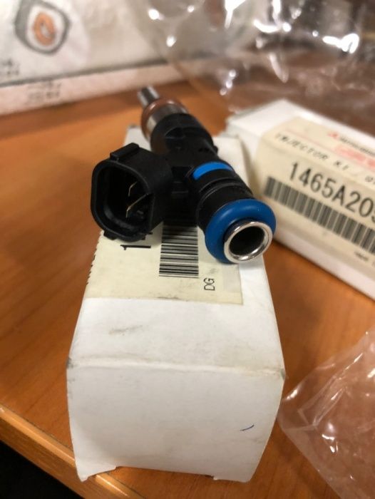 форсунка двигателя Мицубиси аутлендер XL 2,4, 1465A205