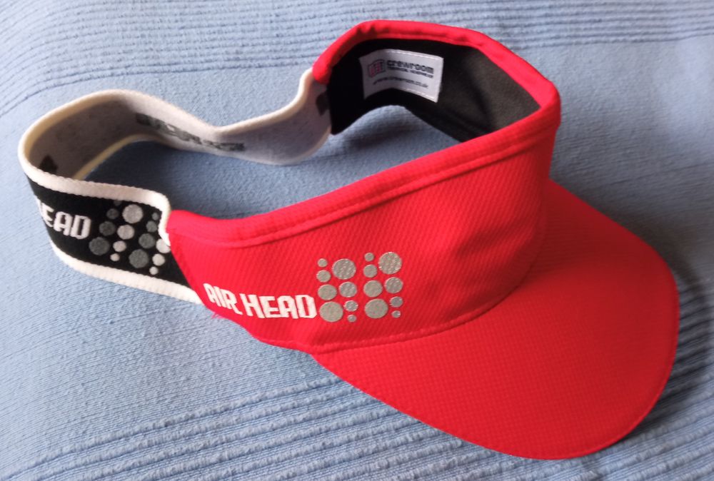 Daszek dla biegacza r.55-58cm.jak.nowy