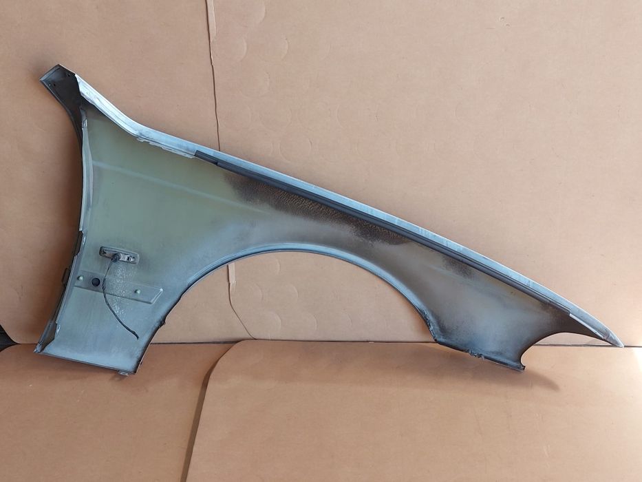 Guarda lamas esquerdo BMW e39