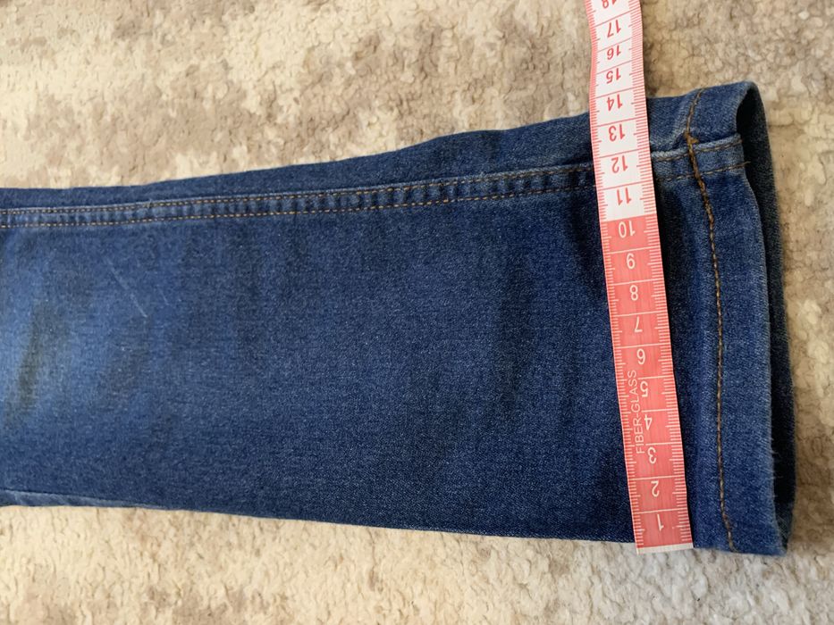 Cienkie elastyczne jeansy slim fit dla chłopca Lupilu rozmiar 128