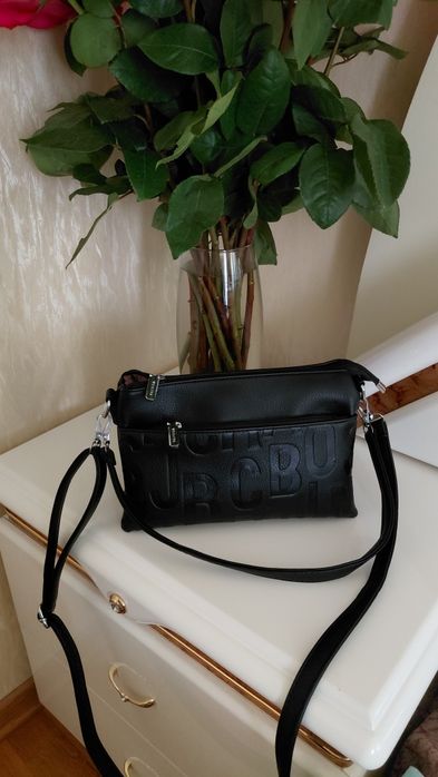 Зручна  сумка- клатч