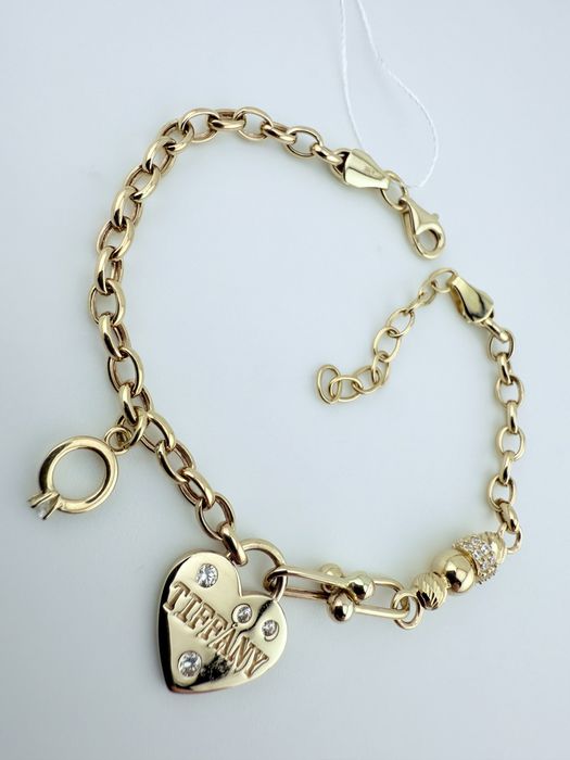 Золотий браслет новий