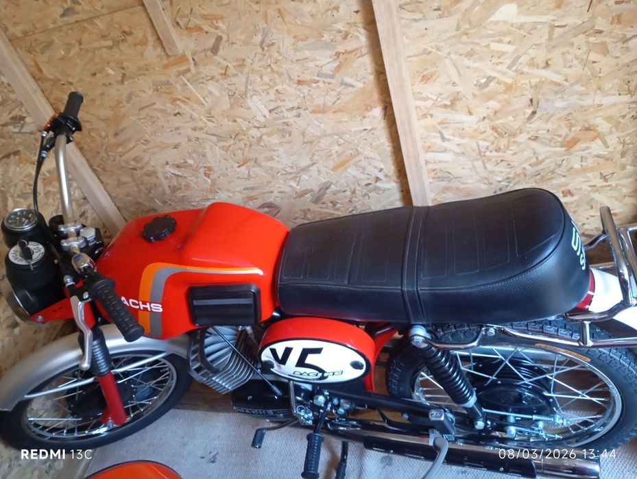 Motorizada casal boss e Sachs V5