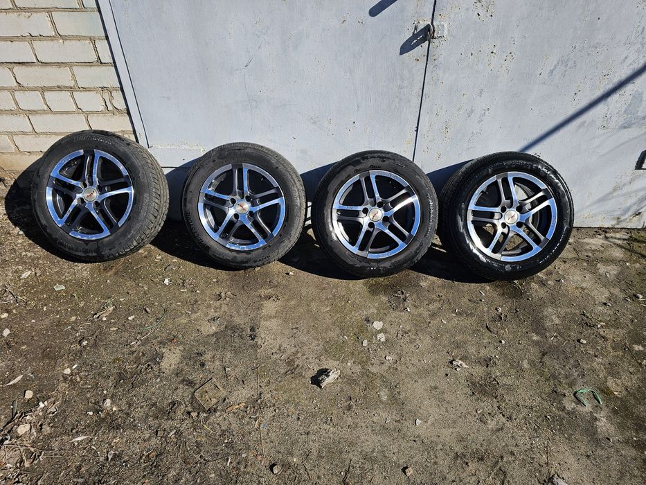 Продам легкосплавные диски с резиной R-14