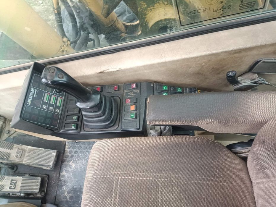 Екскаватор Caterpillar M312