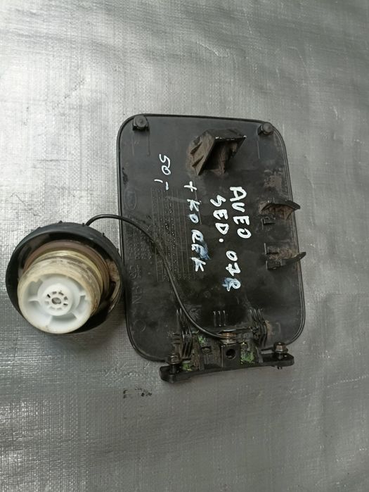 Chevrolet Aveo 1, 4 B sedan klapka wlewu paliwa,+ korek