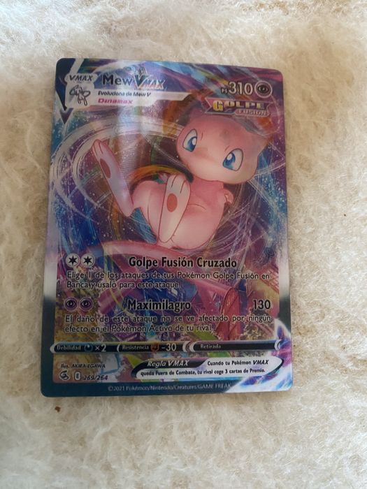 Mew Vmax (Fusion Strike) with two illusion versions.64563994908417123